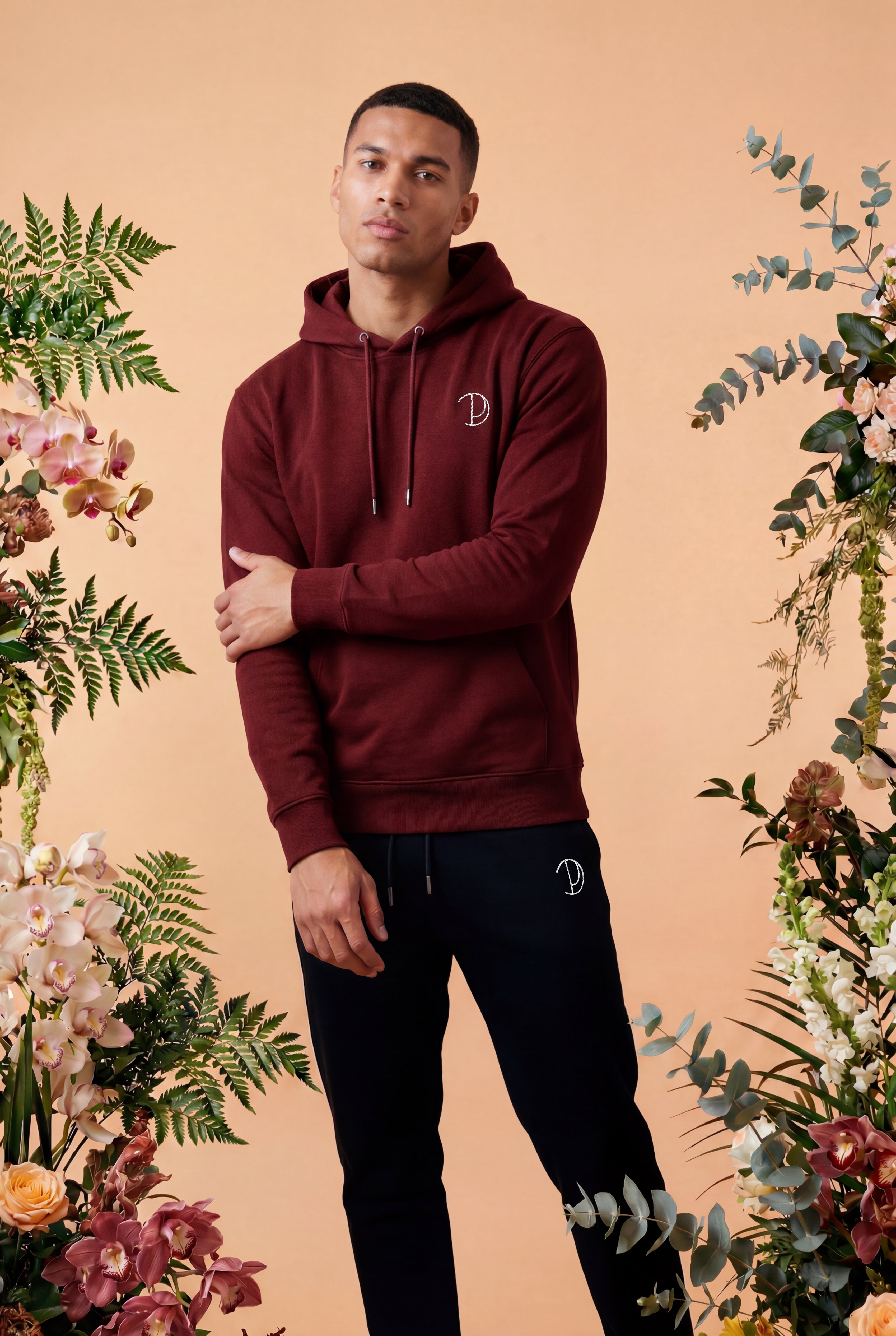 Hoodie med broderad logotyp