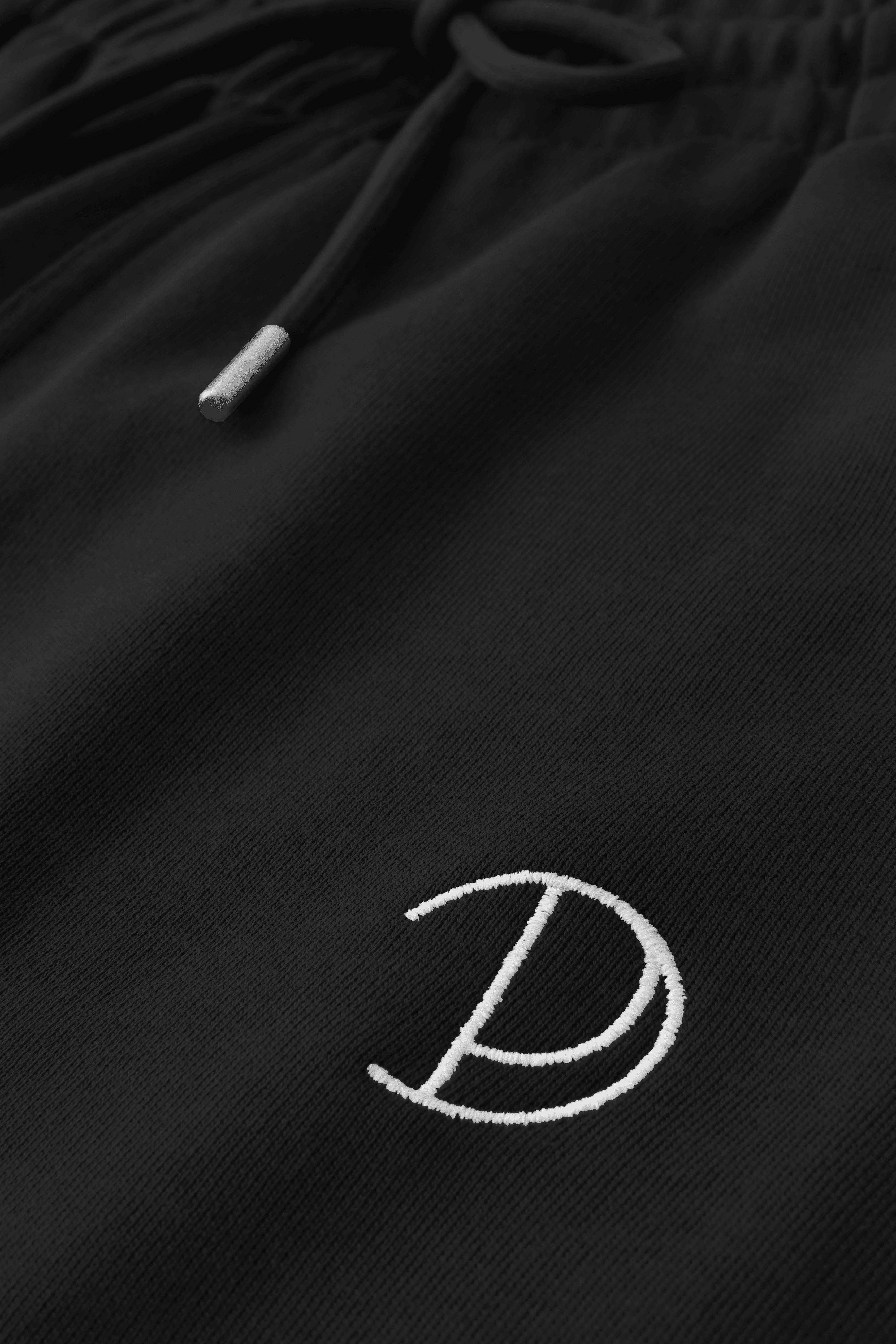 Joggers med brodert P